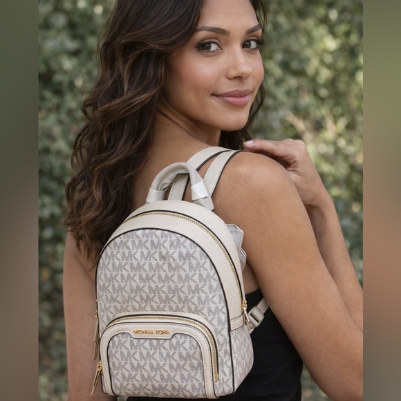 Michael Kors Handbags - 💋SOLD💋NWT Michael Kors Mini Logo Backpack | Signature MK Cream & Gold